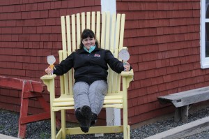 A really big Adirondack chair in front of the Tatamagouche Creamery.